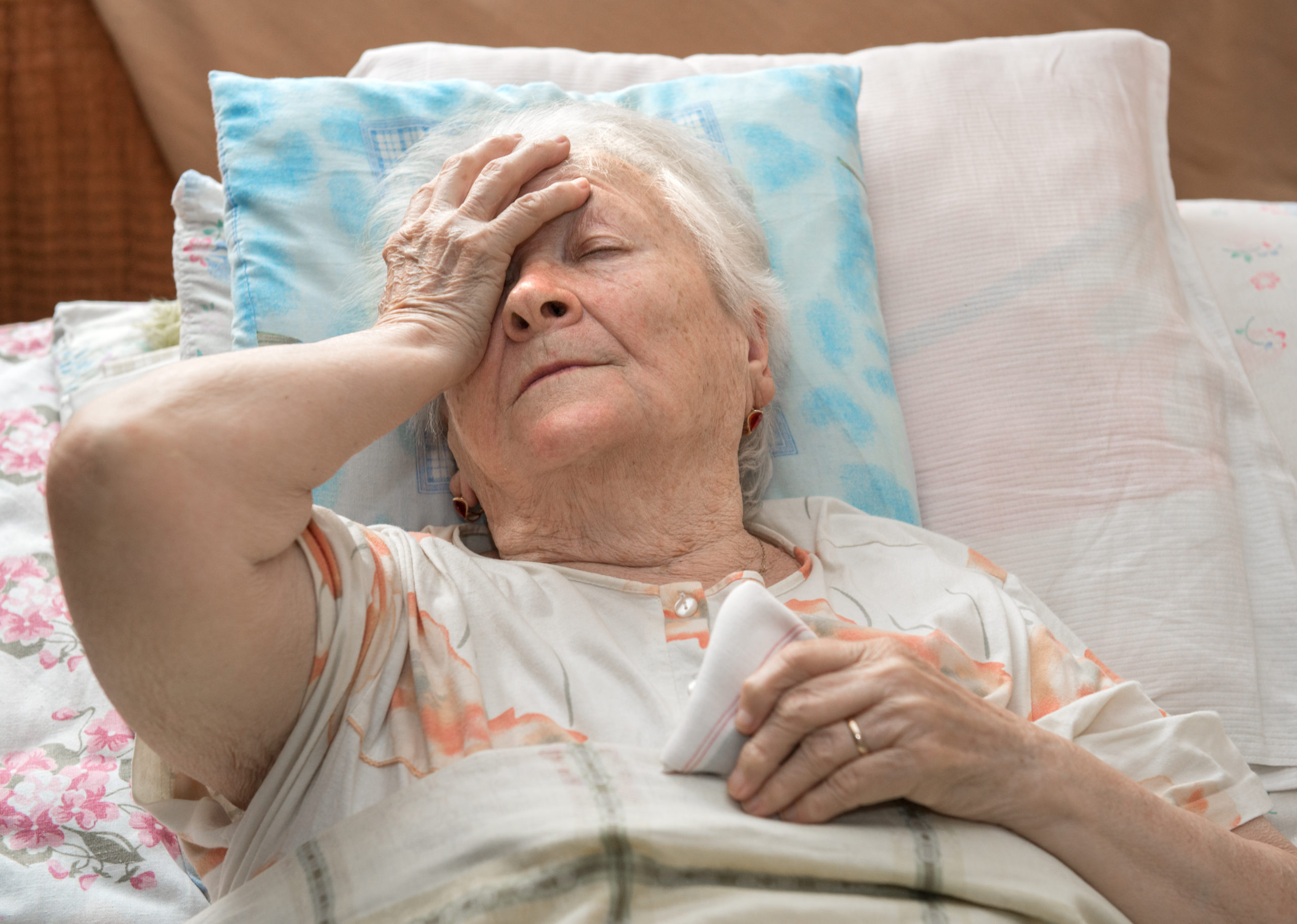 sick older woman, urgent care
